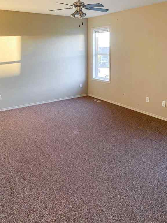 MLS® A2265842 - 7023 Deer Street  in College Heights Lacombe, Residential