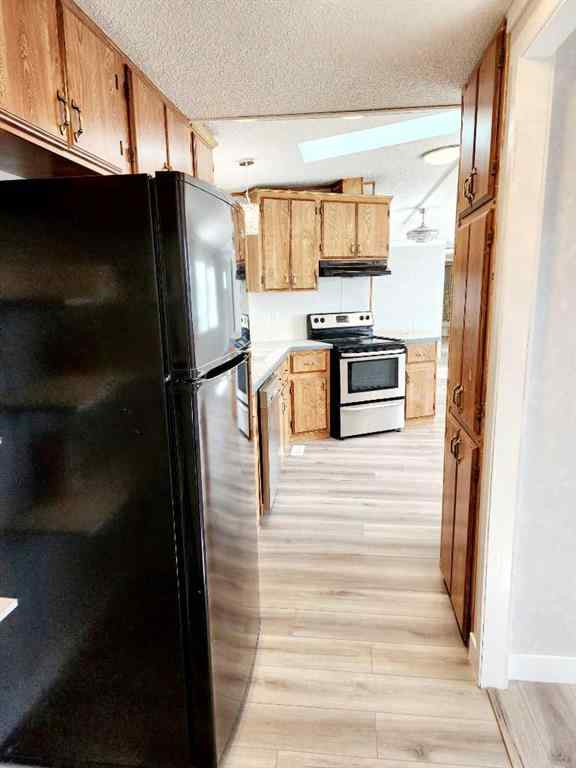 MLS® A2265843 - Unit #34 4922 Womacks Road  in Blackfalds MHP Blackfalds, Mobile