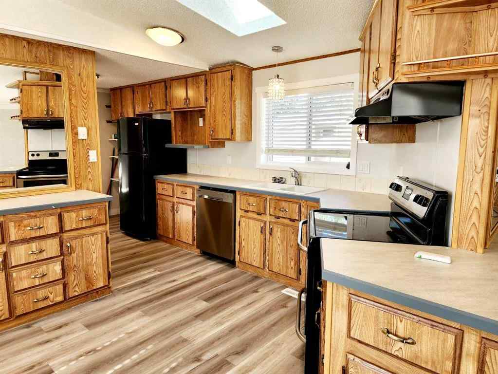 MLS® A2265843 - Unit #34 4922 Womacks Road  in Blackfalds MHP Blackfalds, Mobile