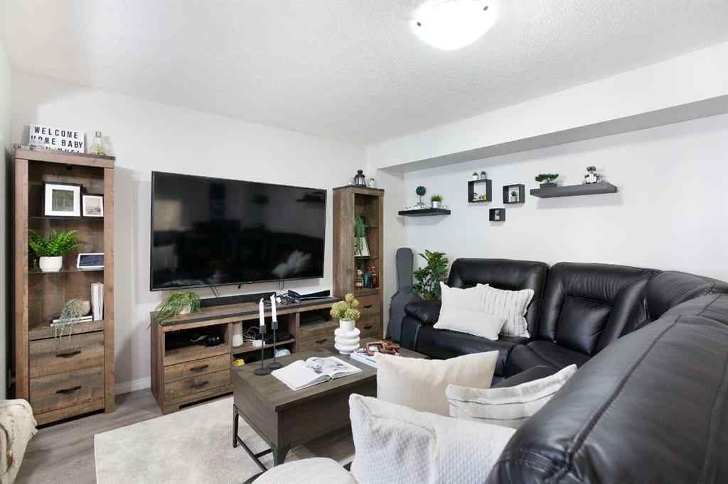 MLS® A2265844 - 214 Hillcrest Gardens SW in Hillcrest Airdrie, Residential