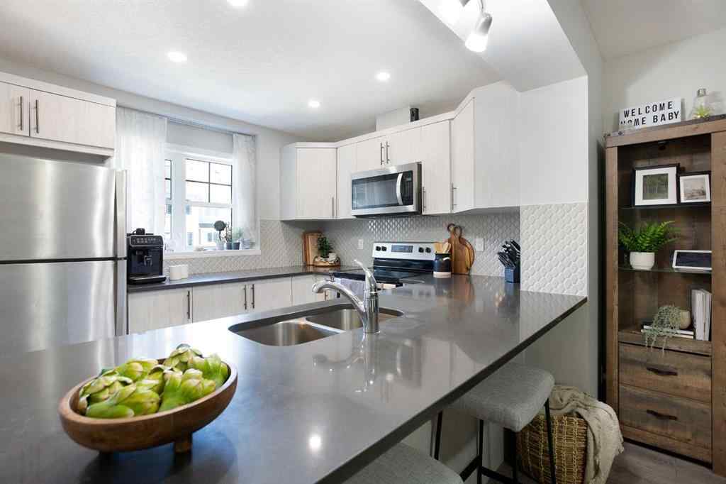 MLS® A2265844 - 214 Hillcrest Gardens SW in Hillcrest Airdrie, Residential