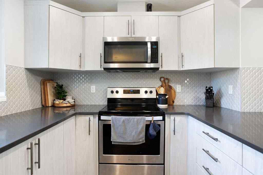 MLS® A2265844 - 214 Hillcrest Gardens SW in Hillcrest Airdrie, Residential