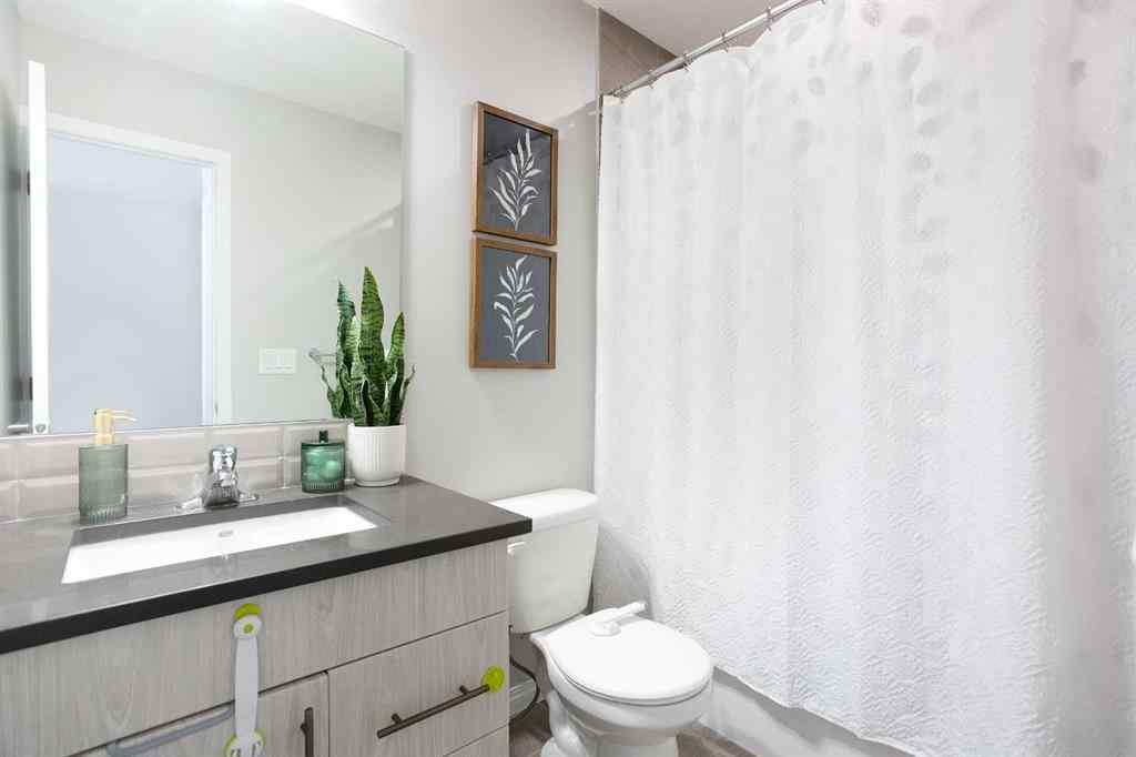 MLS® A2265844 - 214 Hillcrest Gardens SW in Hillcrest Airdrie, Residential