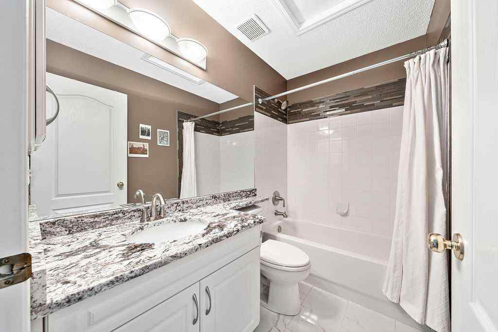 MLS® A2265848 - 143 Country Hills Gardens NW in Country Hills Calgary, Residential