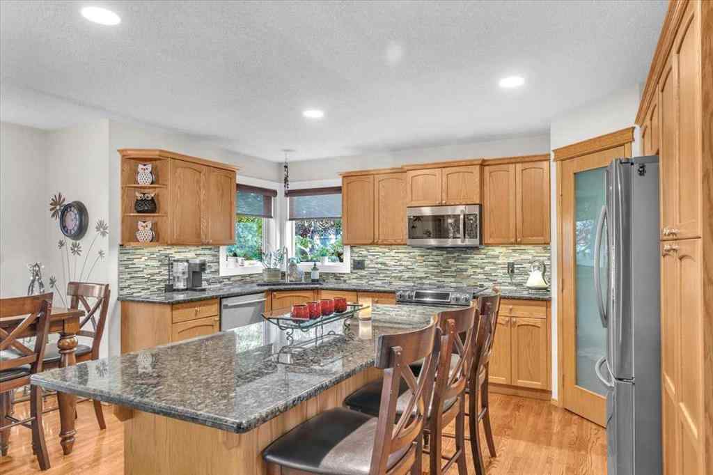 MLS® A2265851 - 20 Tuscany Ridge Green NW in Tuscany Calgary, Residential