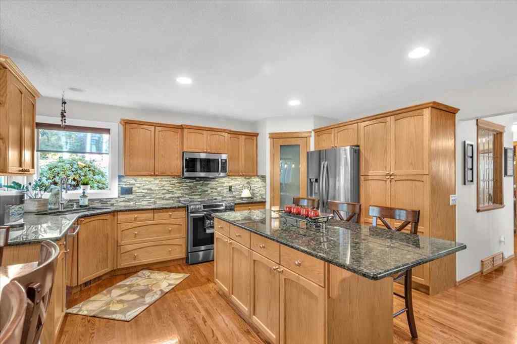 MLS® A2265851 - 20 Tuscany Ridge Green NW in Tuscany Calgary, Residential