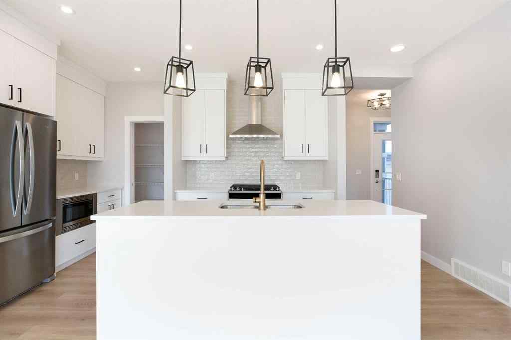 MLS® A2265852 - 125 Cranbrook Gardens SE in Cranston Calgary, Residential