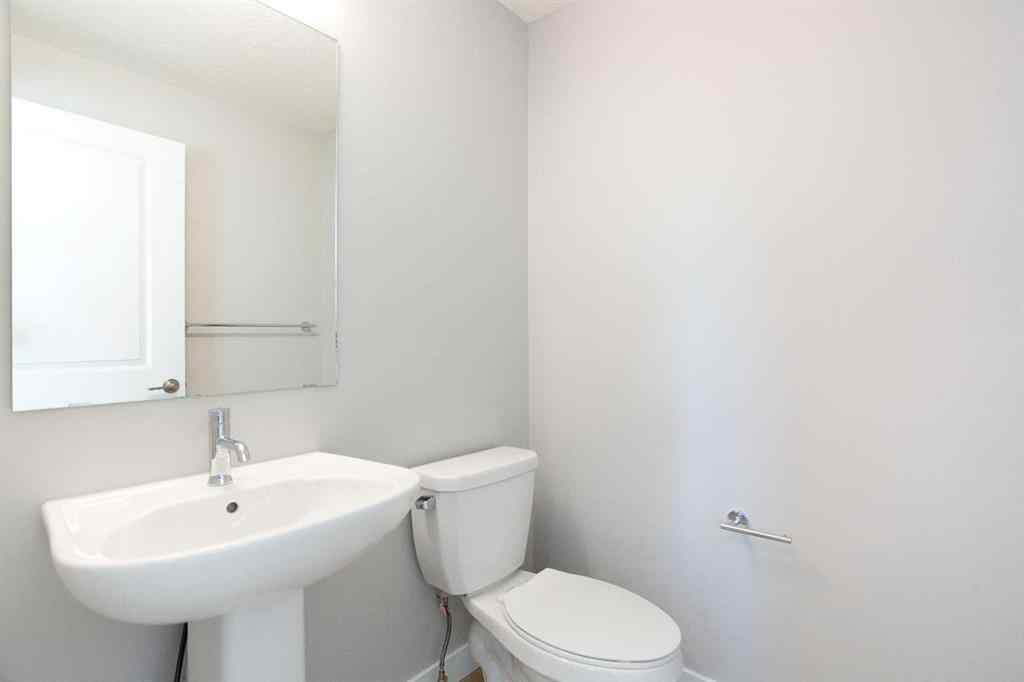 MLS® A2265852 - 125 Cranbrook Gardens SE in Cranston Calgary, Residential