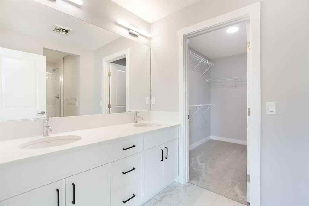 MLS® A2265852 - 125 Cranbrook Gardens SE in Cranston Calgary, Residential