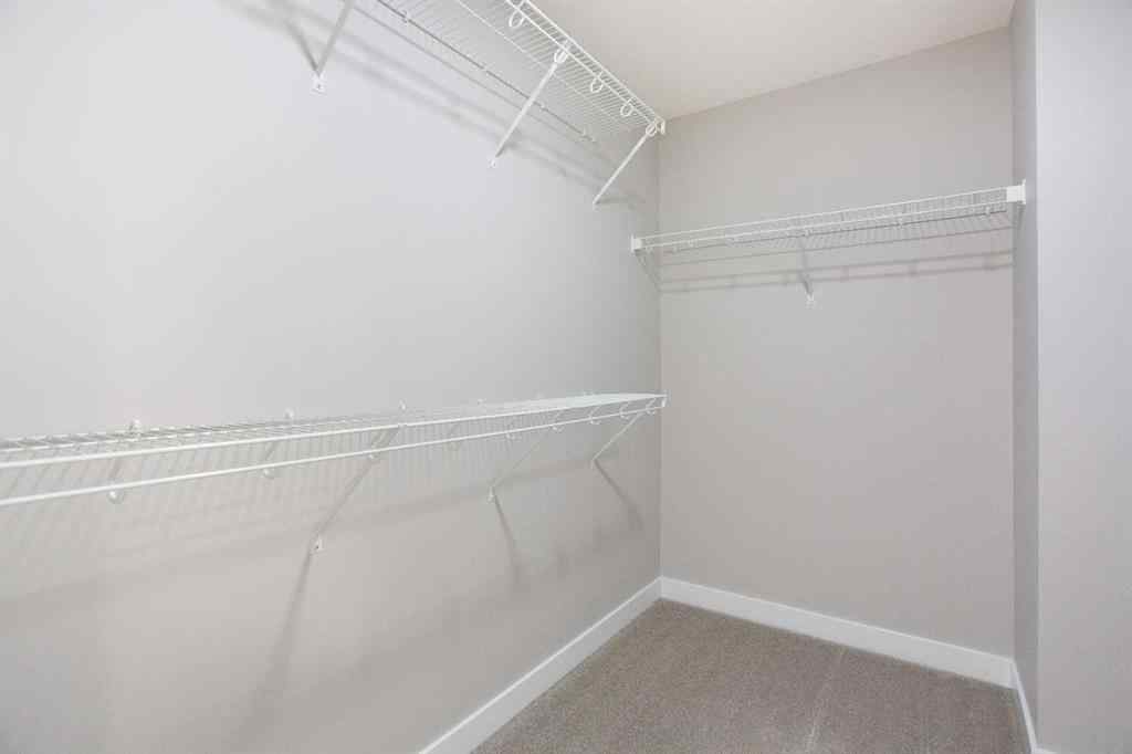 MLS® A2265852 - 125 Cranbrook Gardens SE in Cranston Calgary, Residential