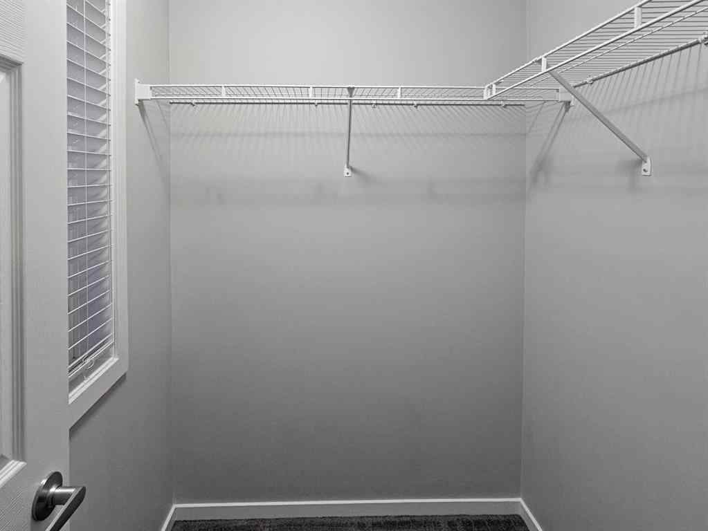 MLS® A2265862 - 1485 148 Avenue NW in Carrington Calgary, Residential