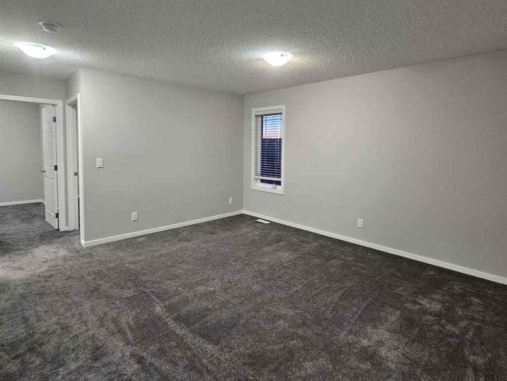 MLS® A2265862 - 1485 148 Avenue NW in Carrington Calgary, Residential