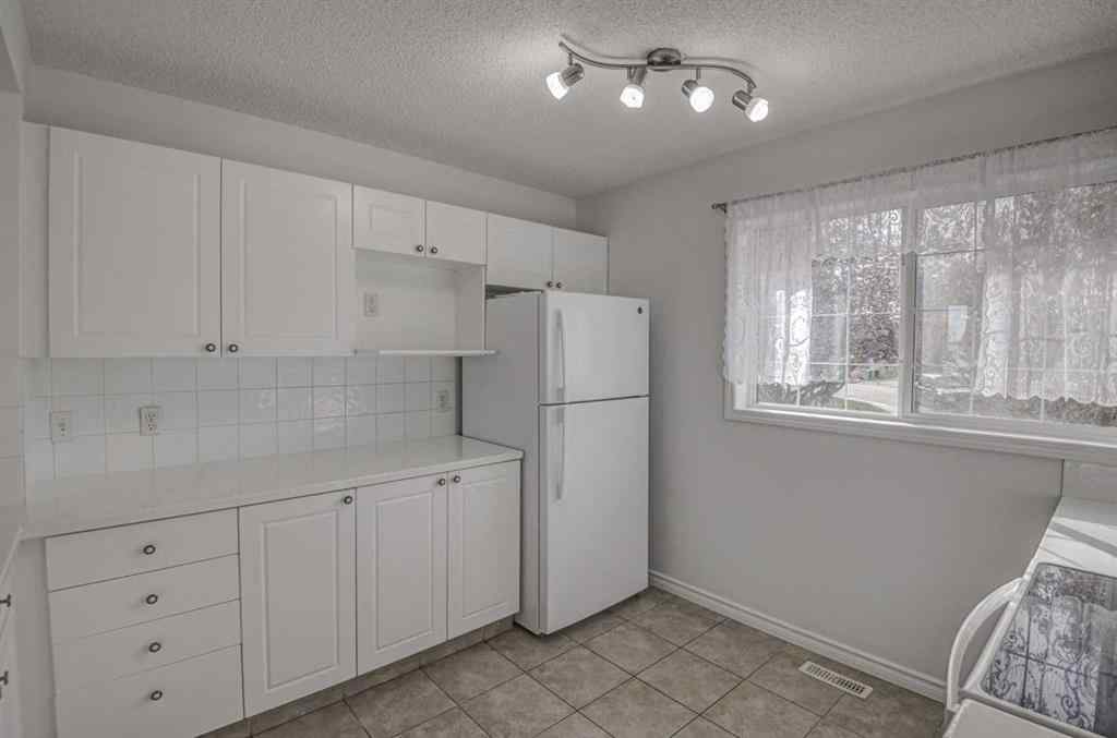 MLS® A2265889 - 217 Somerside Close SW in Somerset Calgary, Residential