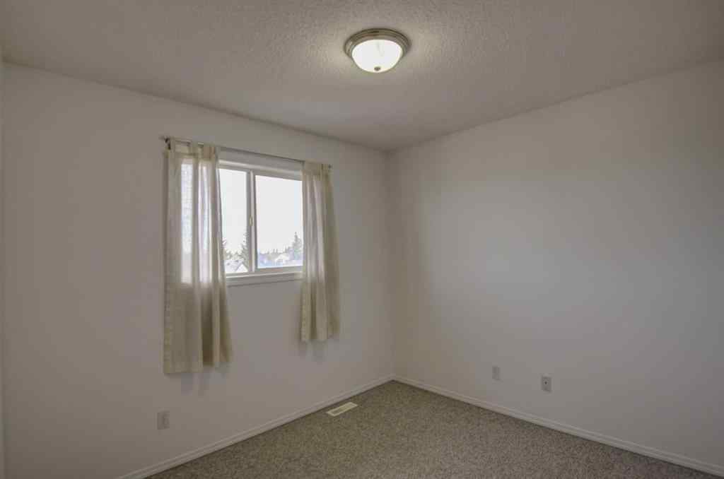 MLS® A2265889 - 217 Somerside Close SW in Somerset Calgary, Residential