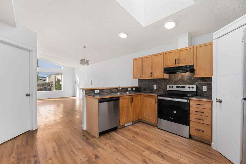 MLS® A2265895 - 203 Prestwick Heights SE in McKenzie Towne Calgary, Residential