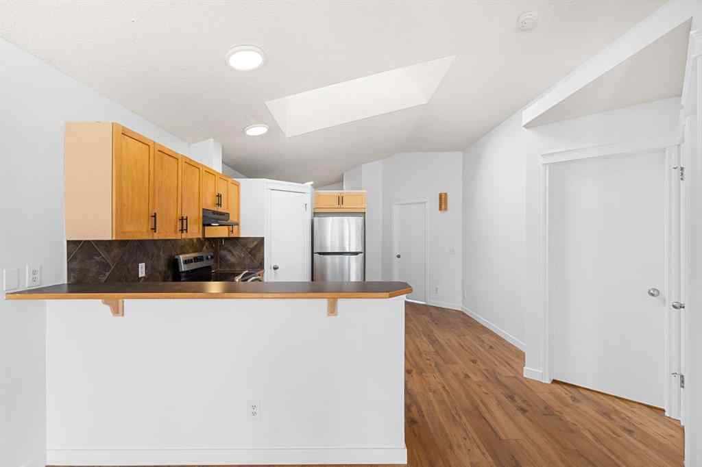 MLS® A2265895 - 203 Prestwick Heights SE in McKenzie Towne Calgary, Residential