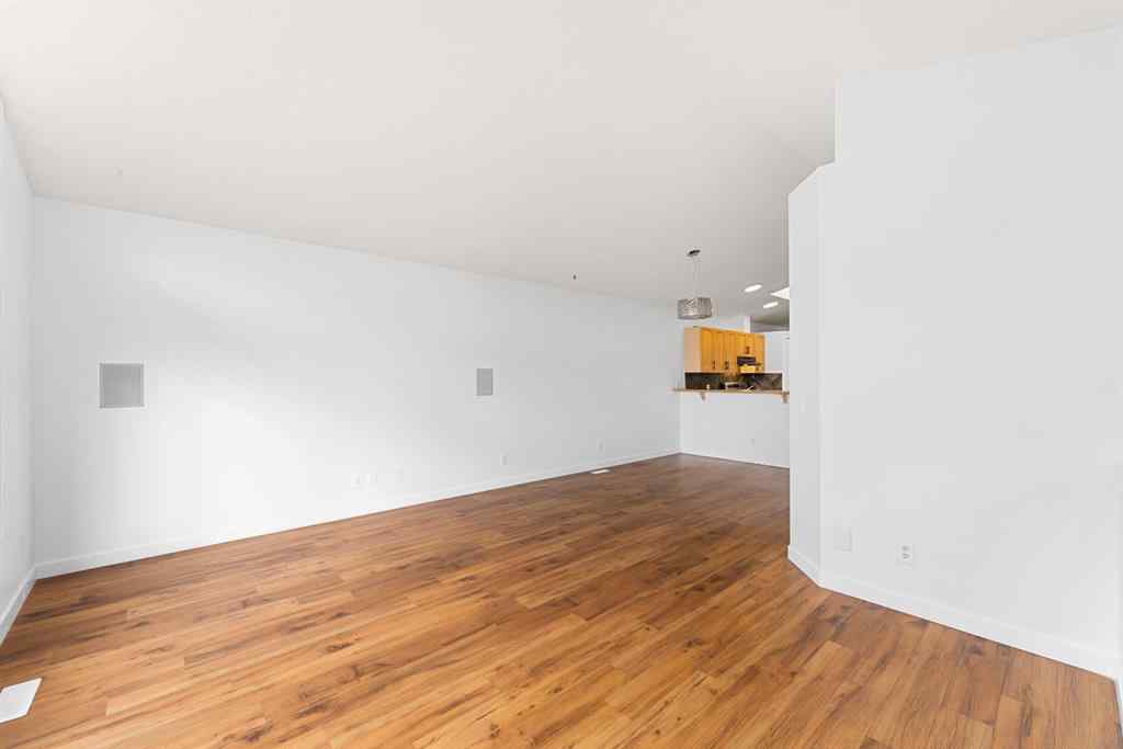 MLS® A2265895 - 203 Prestwick Heights SE in McKenzie Towne Calgary, Residential