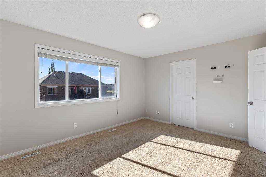 MLS® A2265896 - 724 Windridge Road SW in Windsong Airdrie, Residential