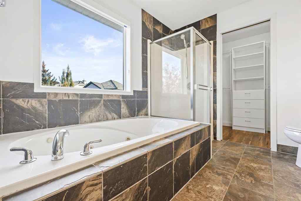 MLS® A2265903 - 7936 Springbank Boulevard SW in Springbank Hill Calgary, Residential