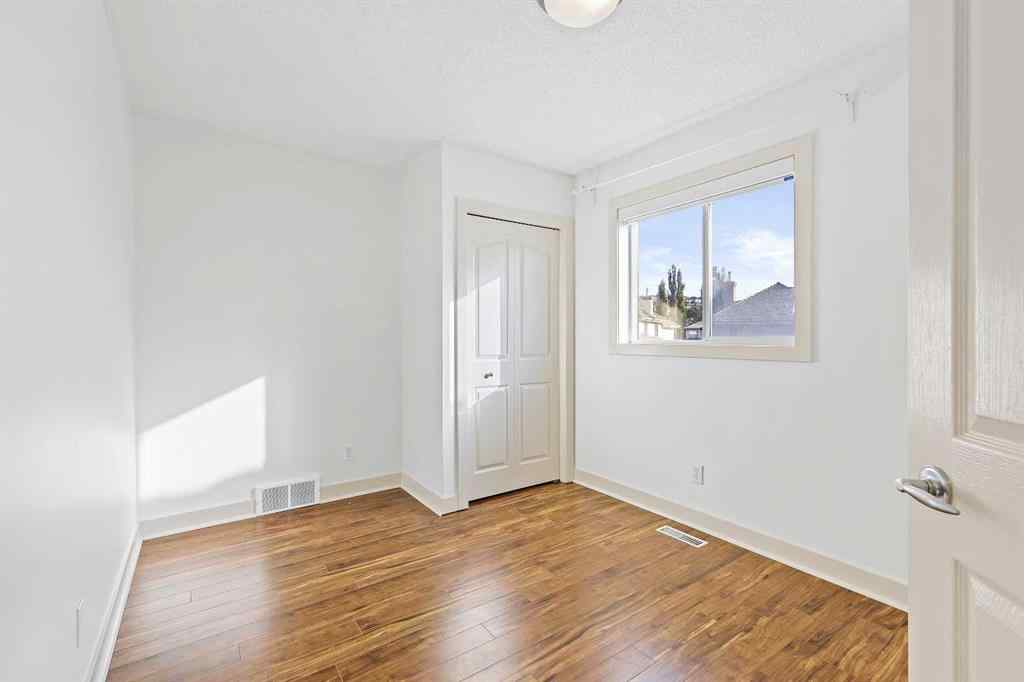 MLS® A2265903 - 7936 Springbank Boulevard SW in Springbank Hill Calgary, Residential