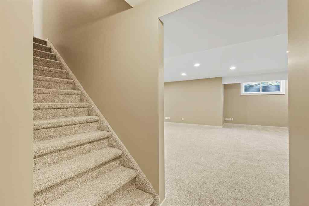 MLS® A2265903 - 7936 Springbank Boulevard SW in Springbank Hill Calgary, Residential