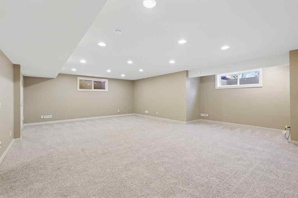 MLS® A2265903 - 7936 Springbank Boulevard SW in Springbank Hill Calgary, Residential