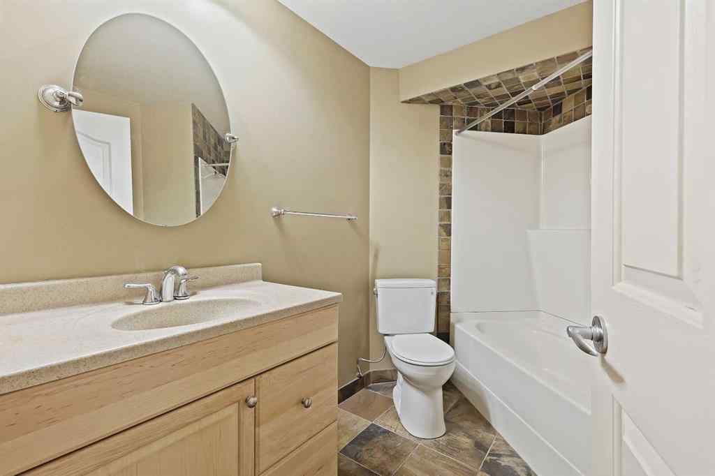 MLS® A2265903 - 7936 Springbank Boulevard SW in Springbank Hill Calgary, Residential