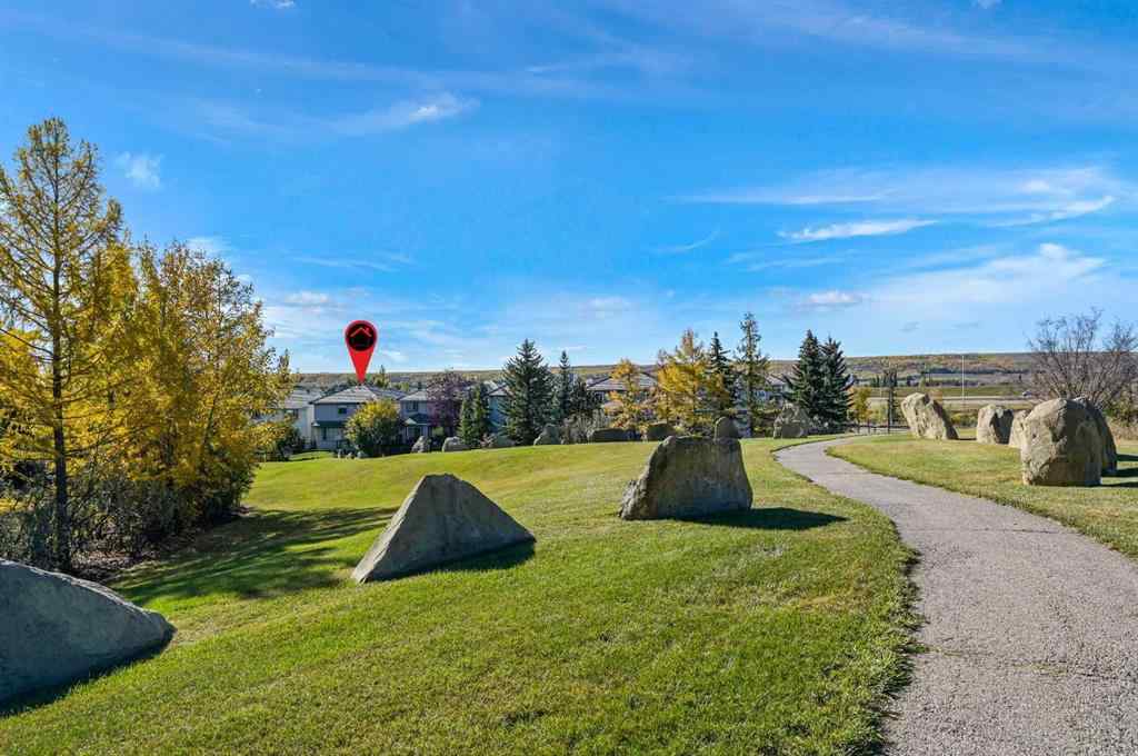 MLS® A2265903 - 7936 Springbank Boulevard SW in Springbank Hill Calgary, Residential