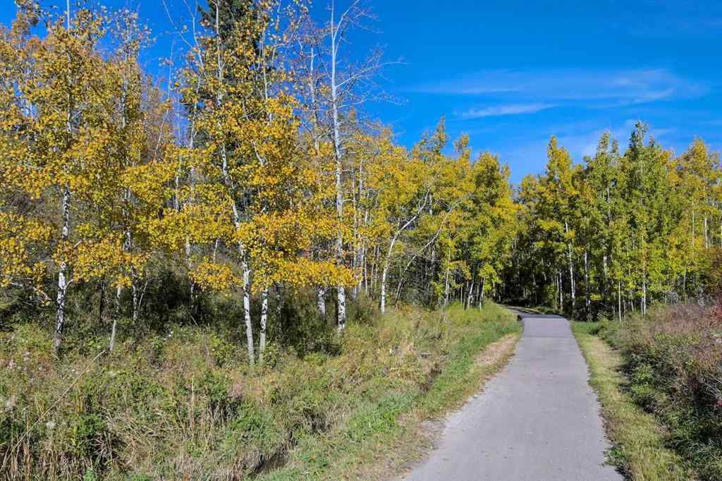 MLS® A2265903 - 7936 Springbank Boulevard SW in Springbank Hill Calgary, Residential