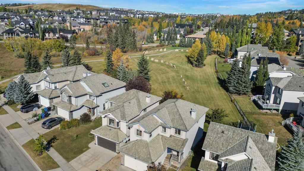 MLS® A2265903 - 7936 Springbank Boulevard SW in Springbank Hill Calgary, Residential