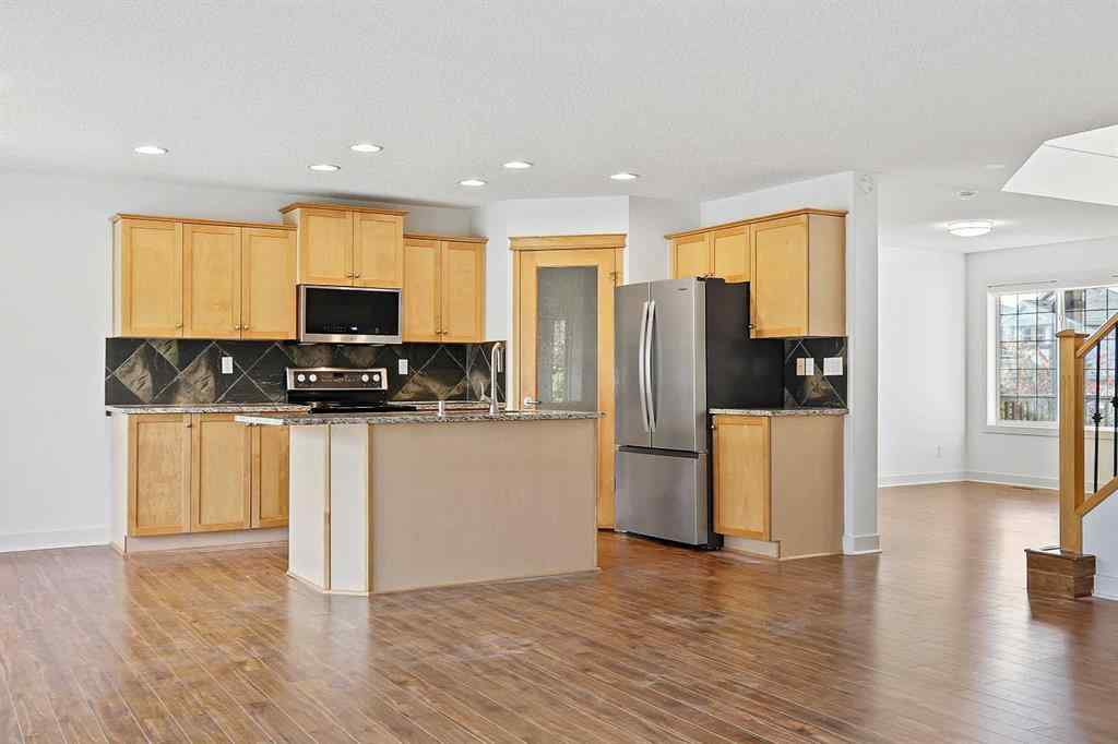 MLS® A2265903 - 7936 Springbank Boulevard SW in Springbank Hill Calgary, Residential