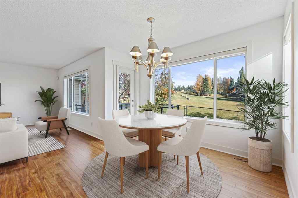 MLS® A2265903 - 7936 Springbank Boulevard SW in Springbank Hill Calgary, Residential