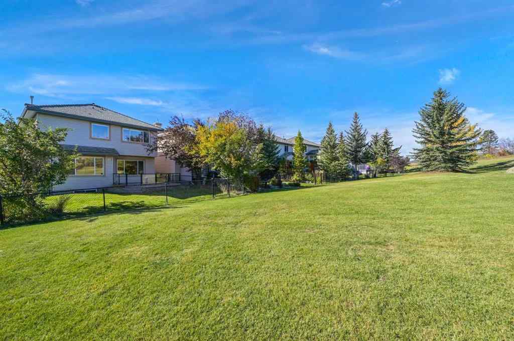 MLS® A2265903 - 7936 Springbank Boulevard SW in Springbank Hill Calgary, Residential