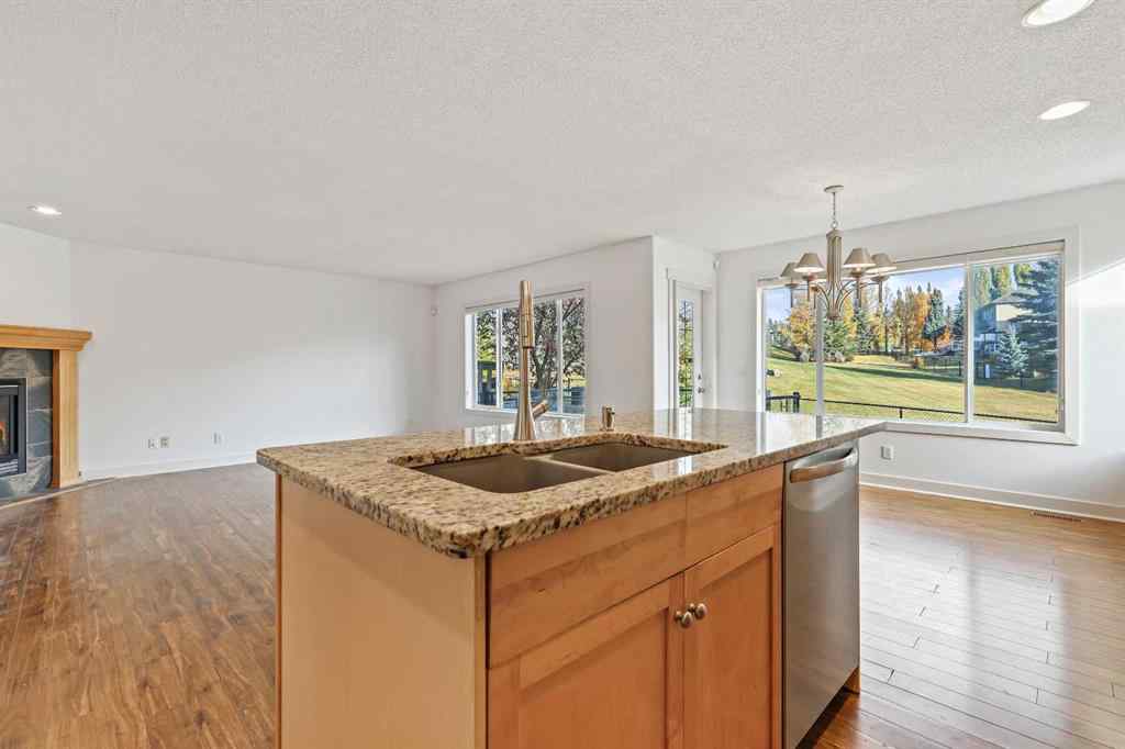 MLS® A2265903 - 7936 Springbank Boulevard SW in Springbank Hill Calgary, Residential