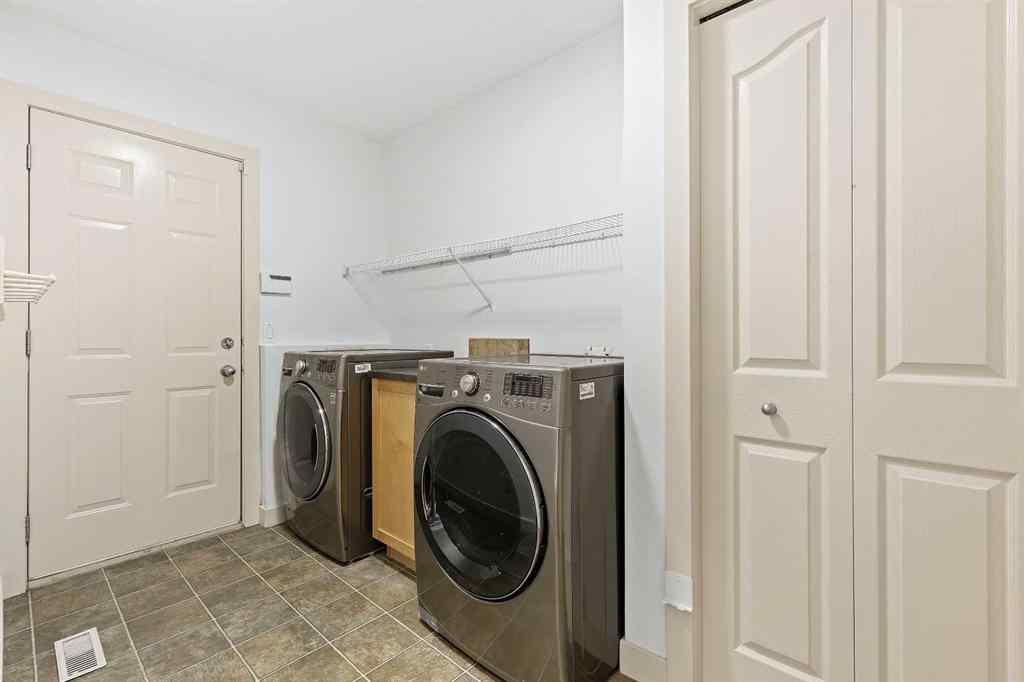 MLS® A2265903 - 7936 Springbank Boulevard SW in Springbank Hill Calgary, Residential