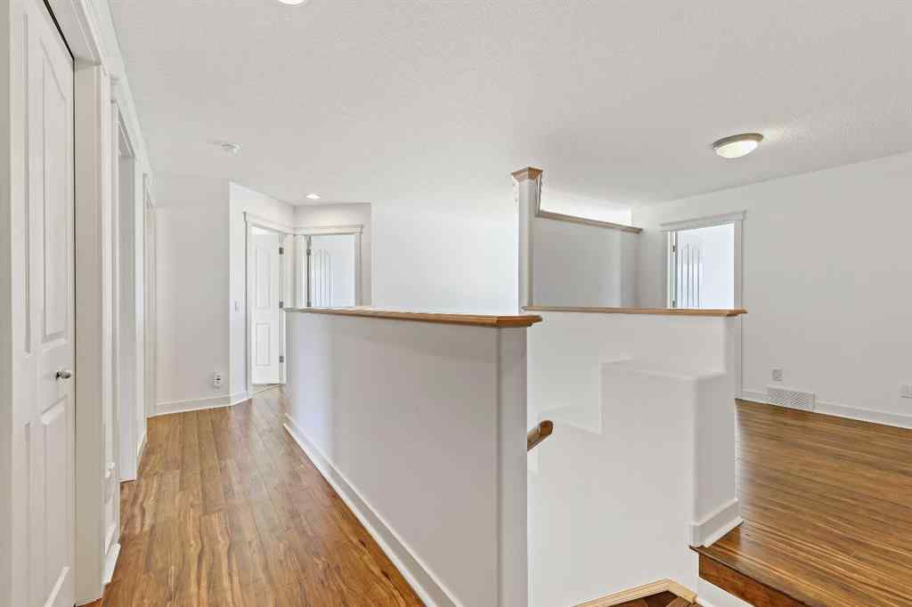 MLS® A2265903 - 7936 Springbank Boulevard SW in Springbank Hill Calgary, Residential