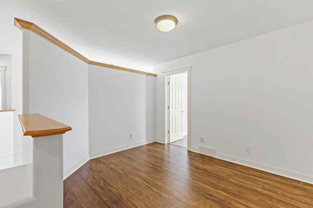 MLS® A2265903 - 7936 Springbank Boulevard SW in Springbank Hill Calgary, Residential