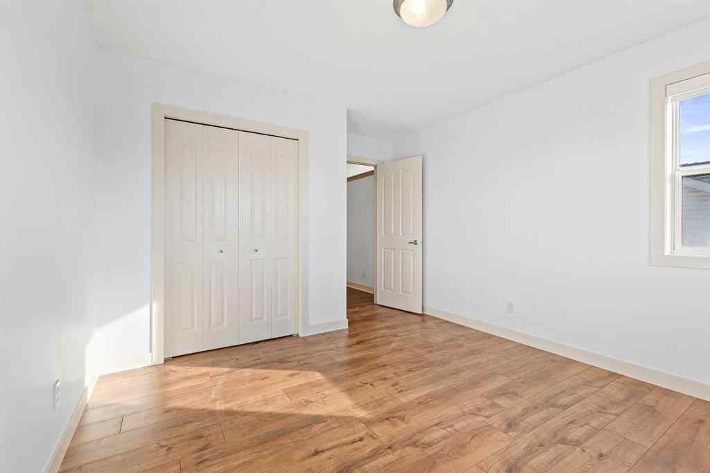 MLS® A2265903 - 7936 Springbank Boulevard SW in Springbank Hill Calgary, Residential