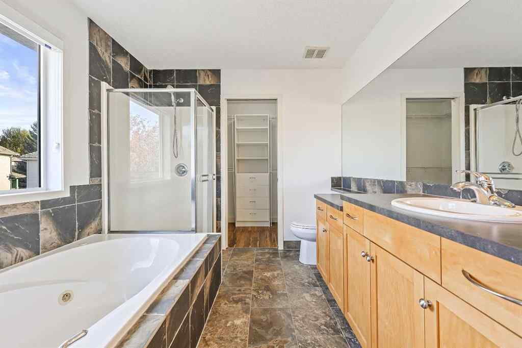 MLS® A2265903 - 7936 Springbank Boulevard SW in Springbank Hill Calgary, Residential