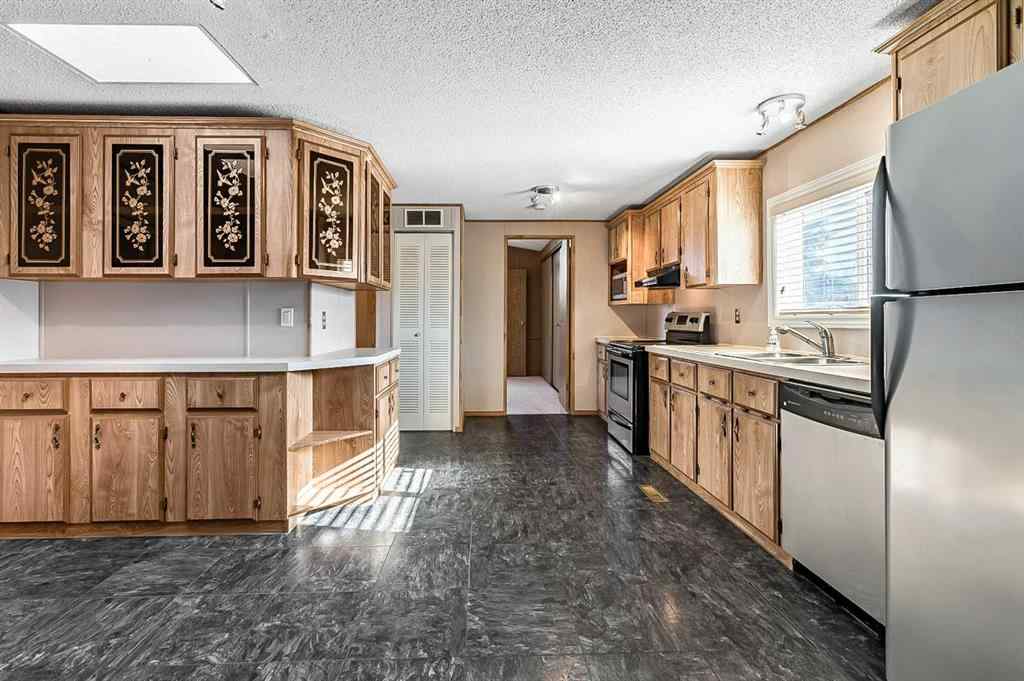 MLS® A2265914 - 422 Homestead Trail SE in Southeast Central High River High River, Mobile