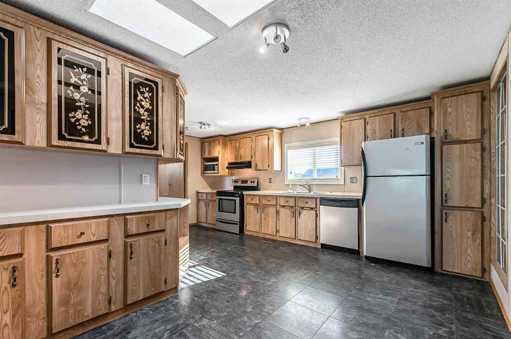 MLS® A2265914 - 422 Homestead Trail SE in Southeast Central High River High River, Mobile