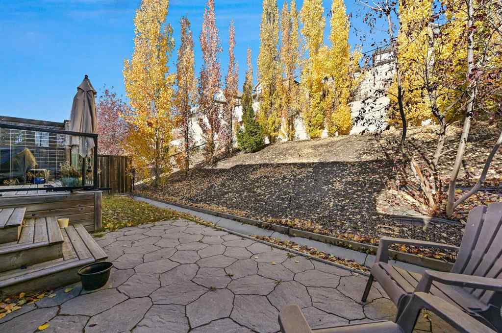 MLS® A2265921 - 129 Springbluff Boulevard SW in Springbank Hill Calgary, Residential