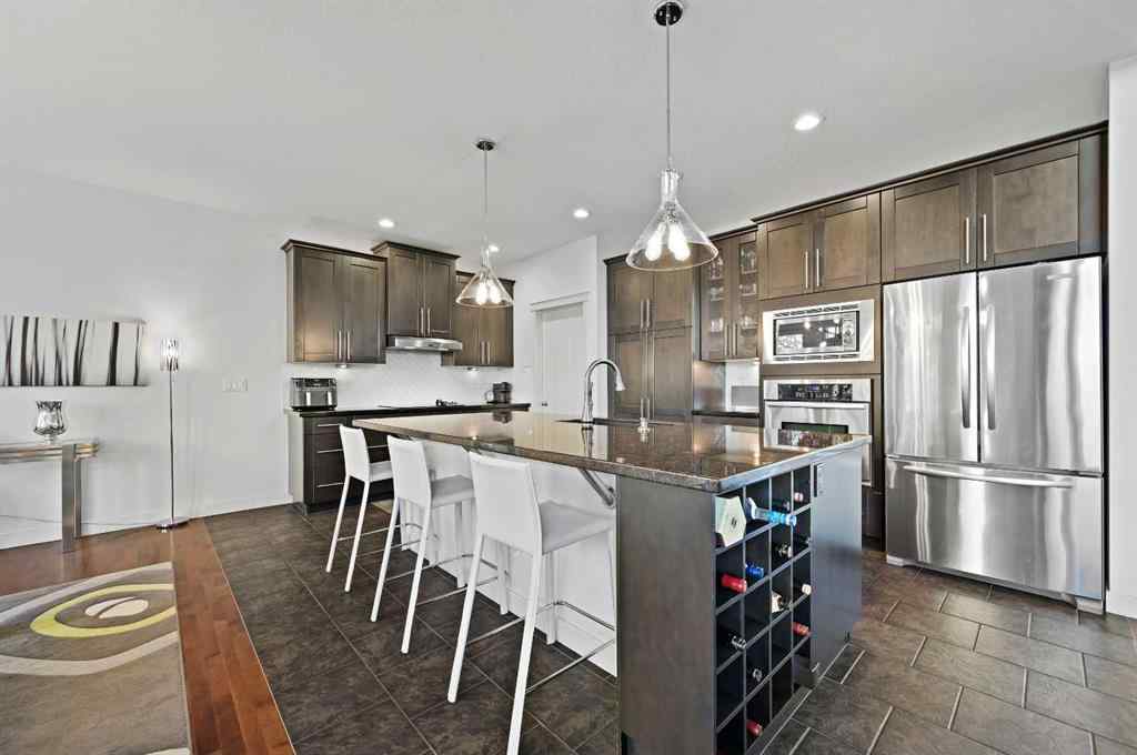 MLS® A2265921 - 129 Springbluff Boulevard SW in Springbank Hill Calgary, Residential