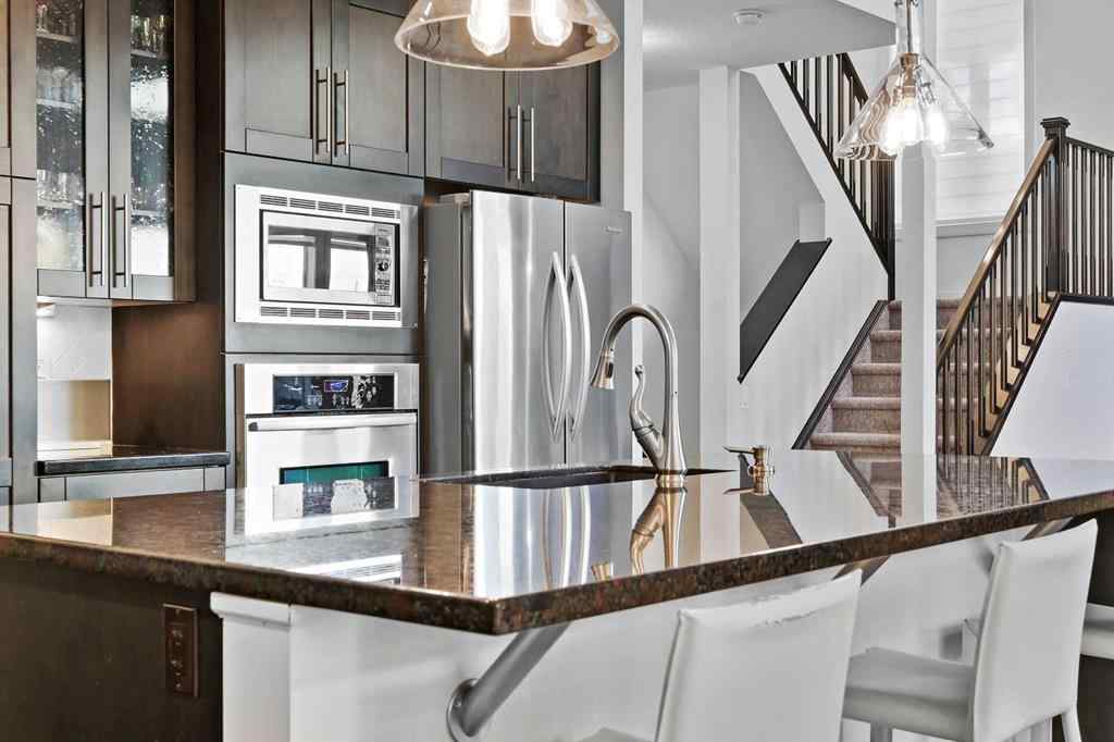 MLS® A2265921 - 129 Springbluff Boulevard SW in Springbank Hill Calgary, Residential