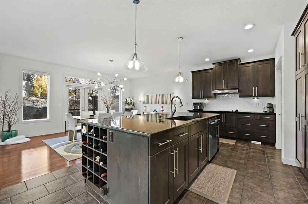 MLS® A2265921 - 129 Springbluff Boulevard SW in Springbank Hill Calgary, Residential