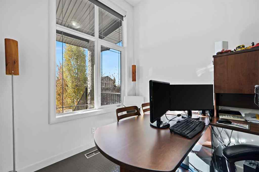 MLS® A2265921 - 129 Springbluff Boulevard SW in Springbank Hill Calgary, Residential