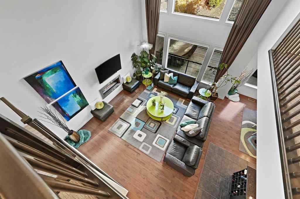 MLS® A2265921 - 129 Springbluff Boulevard SW in Springbank Hill Calgary, Residential