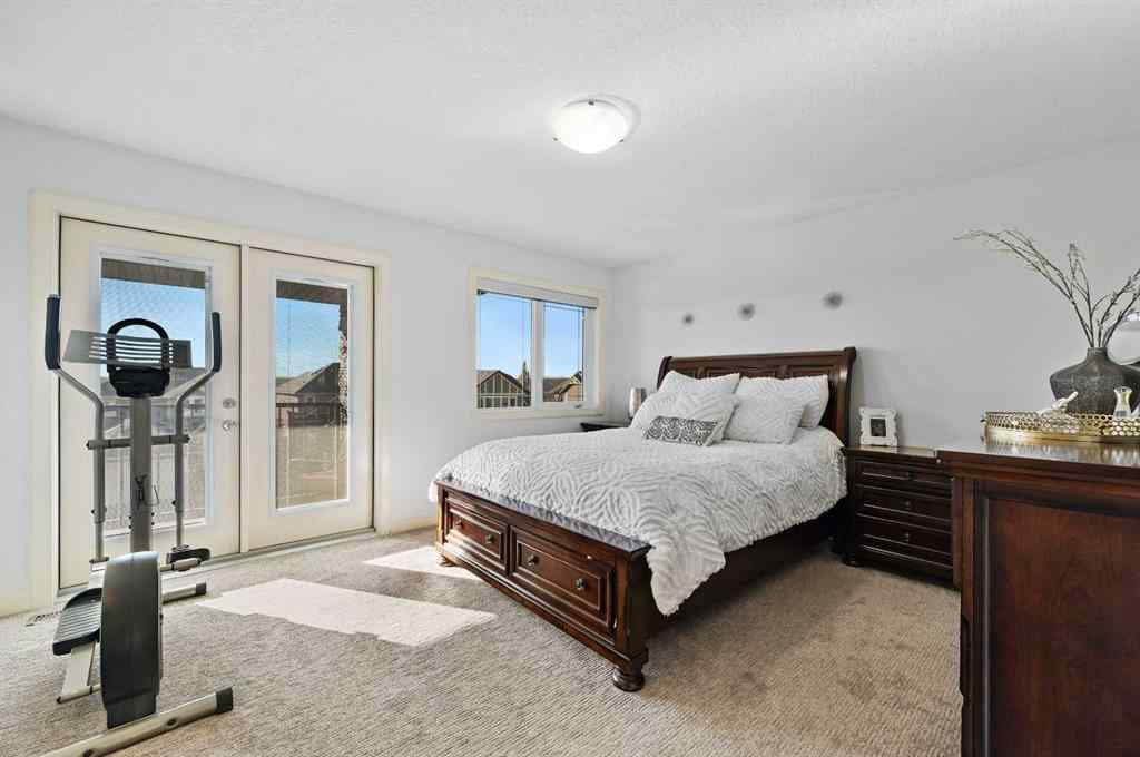 MLS® A2265921 - 129 Springbluff Boulevard SW in Springbank Hill Calgary, Residential