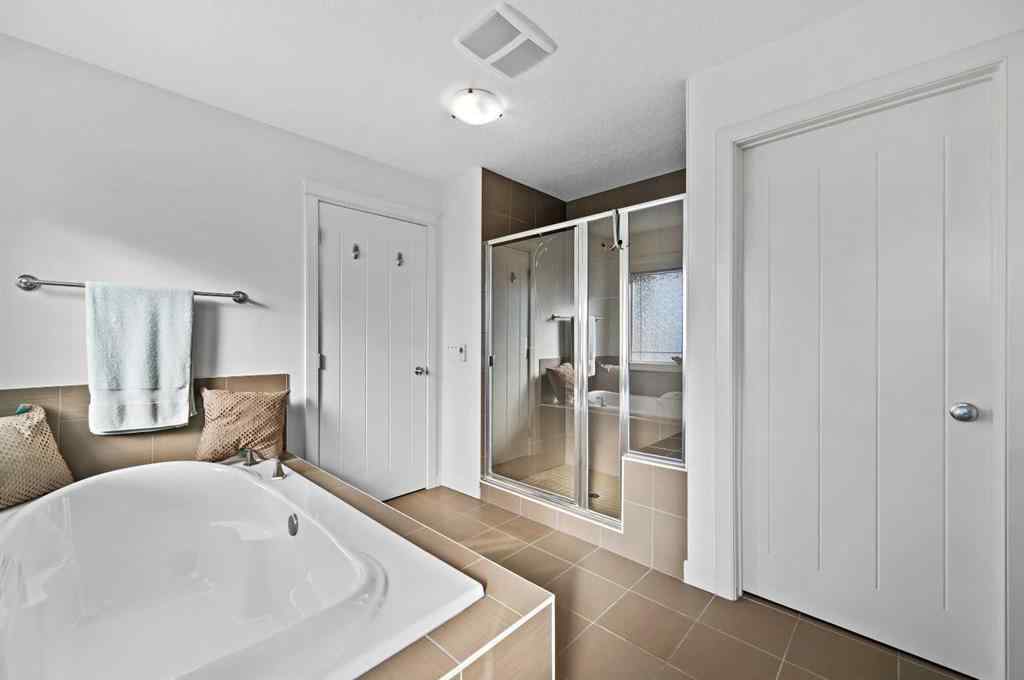 MLS® A2265921 - 129 Springbluff Boulevard SW in Springbank Hill Calgary, Residential