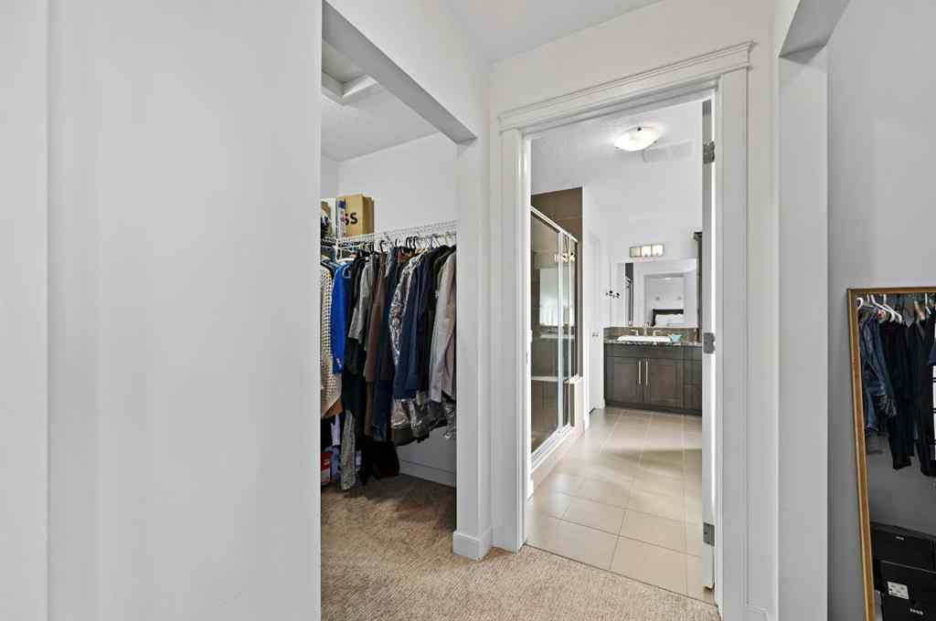 MLS® A2265921 - 129 Springbluff Boulevard SW in Springbank Hill Calgary, Residential